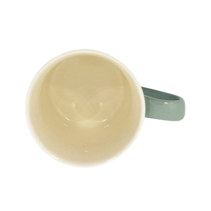 Cow Mug in Green 250ml Inside