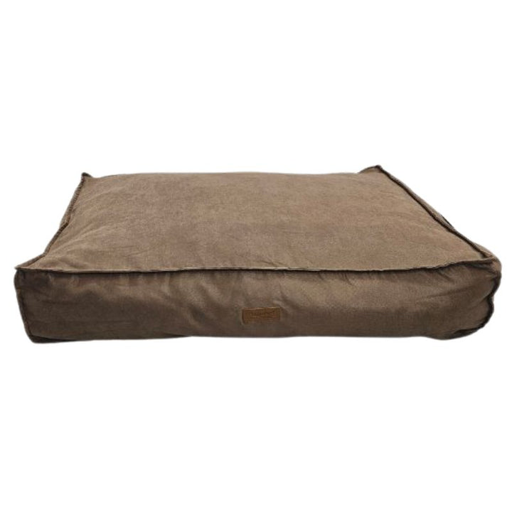 Brown dog bed with a visible brand label on a white background