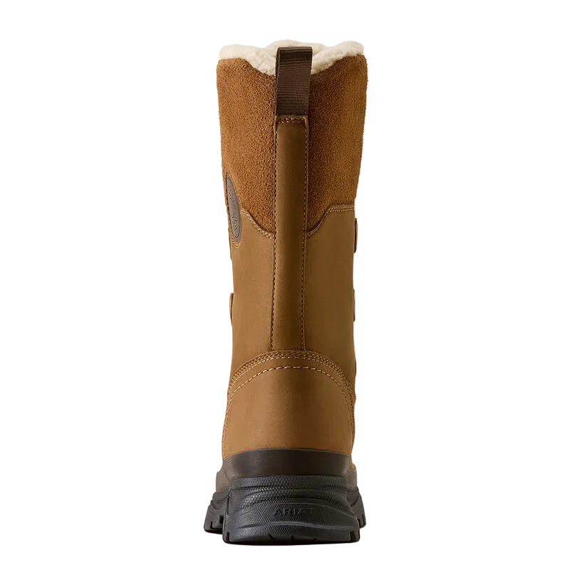 A single mid-calf winter boot shown from the back, featuring a brown suede and leather upper, a black rubber sole, and a white shearling lining at the top, set against a plain off-white background.