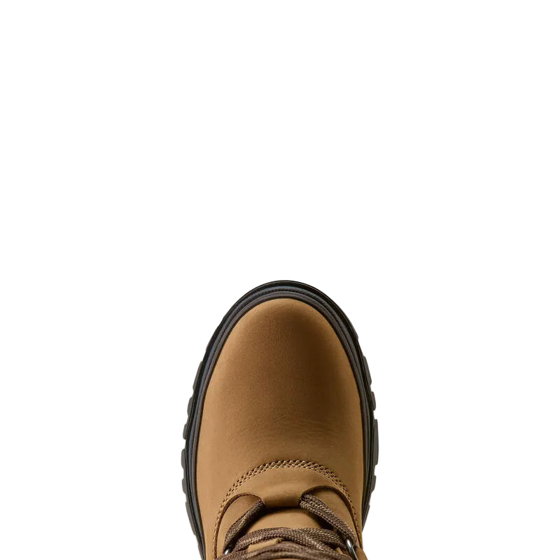 A close-up top-down view of a tan leather boot with a black sole, centered against a solid off-white background.