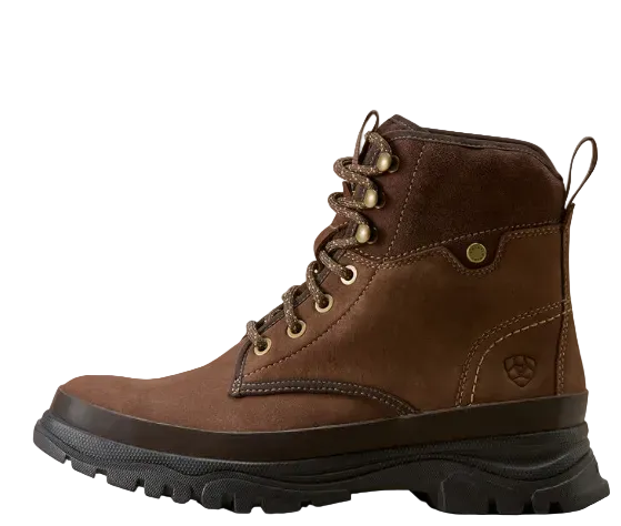 A brown suede and leather lace-up work boot with a thick black lug sole, shown in a side profile on a light beige background.
