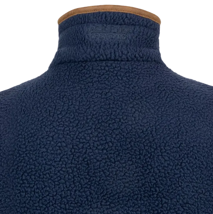 Close-up of the back of a navy blue fleece pullover jacket on a mannequin, showing a high collar with a tan inner lining and an embossed 'AGLEBUR FLECKLAND' logo.