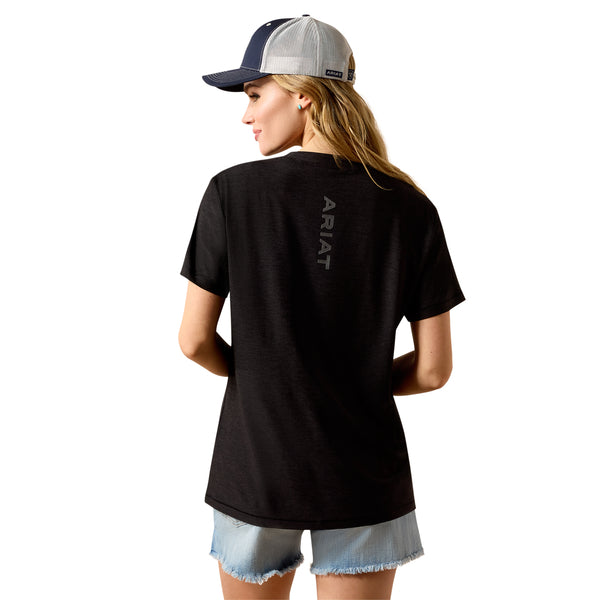 Person wearing a black t-shirt with 'Ariat' branding on the back, standing against a white background.