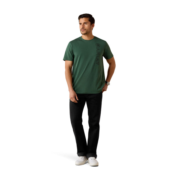 Man wearing a green t-shirt and black pants on a white background