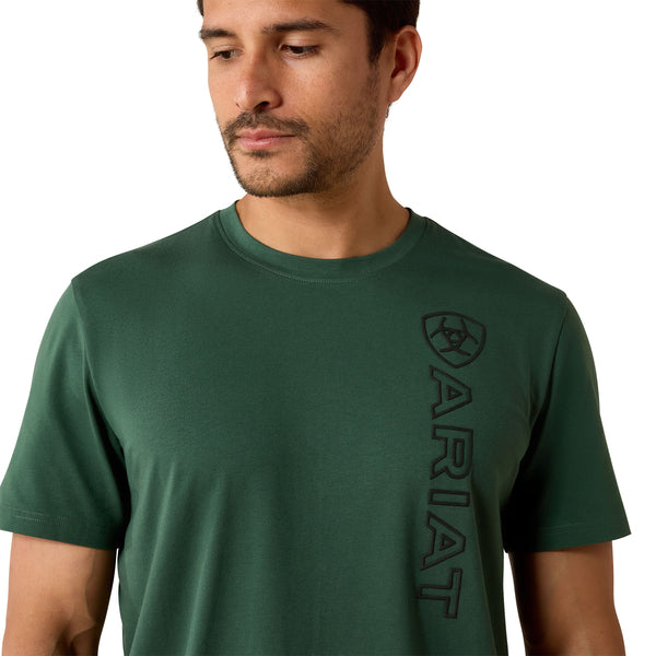 Man wearing a green t-shirt with Ariat logo on a white background