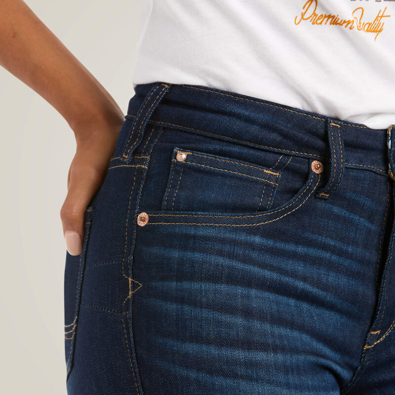 Ariat R.E.A.L. High Rise Ballary Boot Cut Jeans in Pennsylvania wash, close-up showing high-rise waistband, front pockets, copper rivets and contrast stitching on dark blue denim.